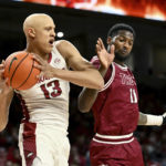 No. 11 Arkansas uses late run to beat Troy, 74-61