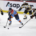Panthers score 3 in 2nd period, halt Bruins win streak at 7