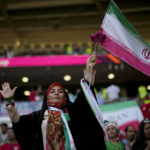 Iran regime supporters confront protesters at World Cup game