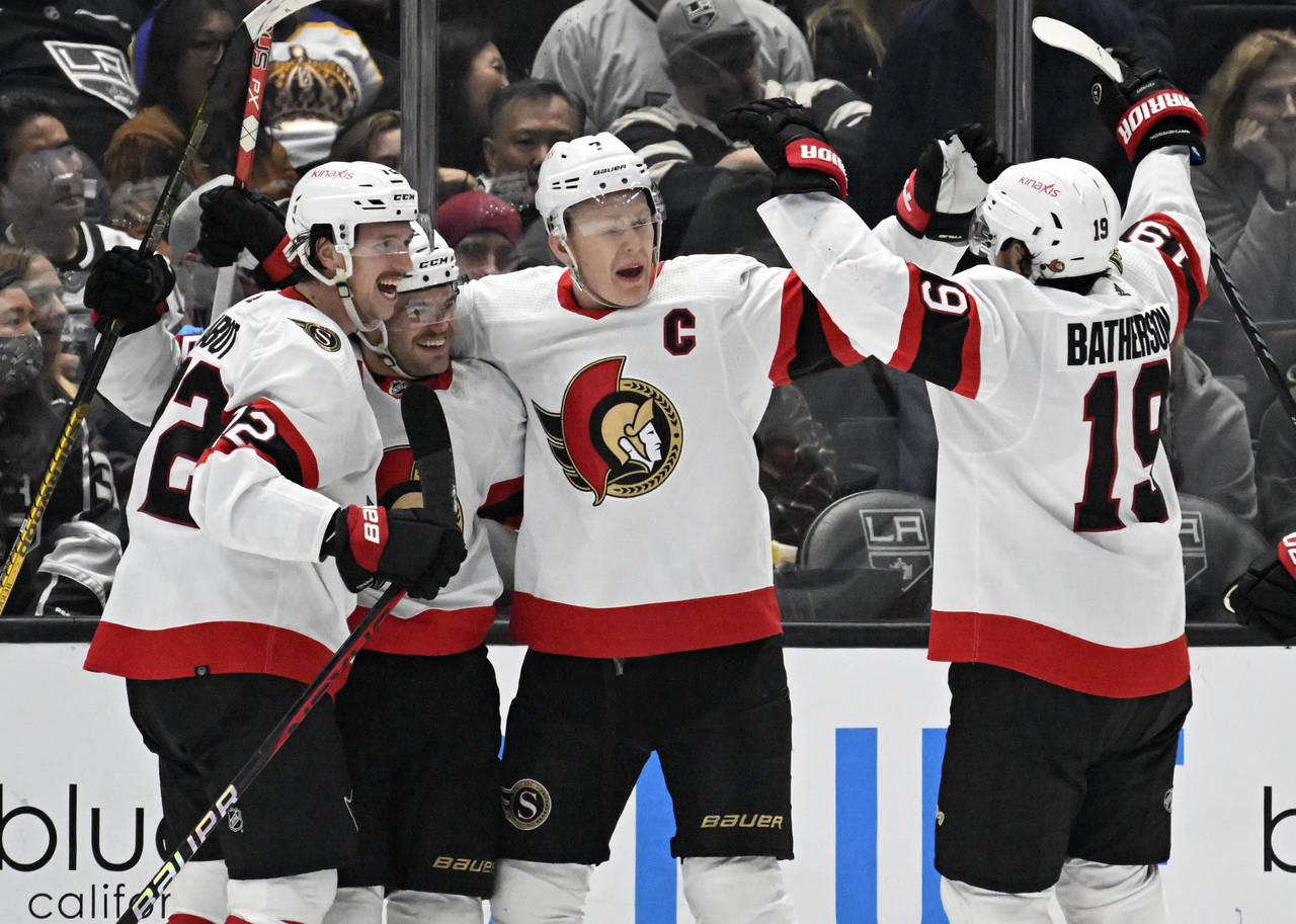 Ottawa Senators celebrate a goal against the Los Angeles Kings during the second period in an NHL h...