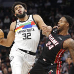 Towns scores 25, Wolves hold on against Heat for 105-101 win