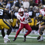 Thompson's three TD passes lead Nebraska over Iowa 24-17