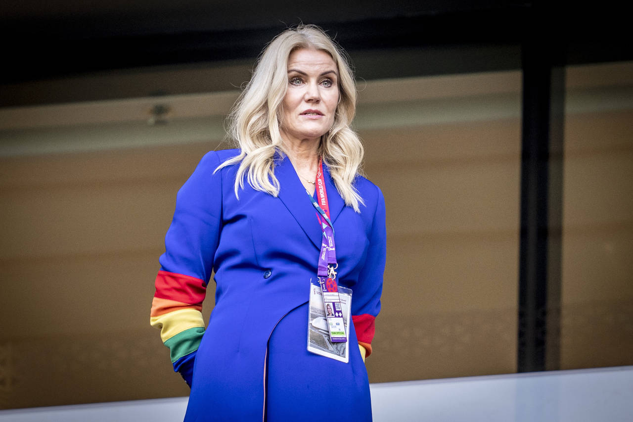 Former Danish Prime Minister Helle Thorning-Schmidt wears a rainbow-colored armband before a World ...