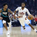 Mitchell scores 34, Cavaliers beat Trail Blazers 114-96
