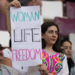 Barred from stadiums at home, Iran women travel to World Cup