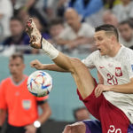 Messi and Argentina advance at World Cup, beat Poland 2-0