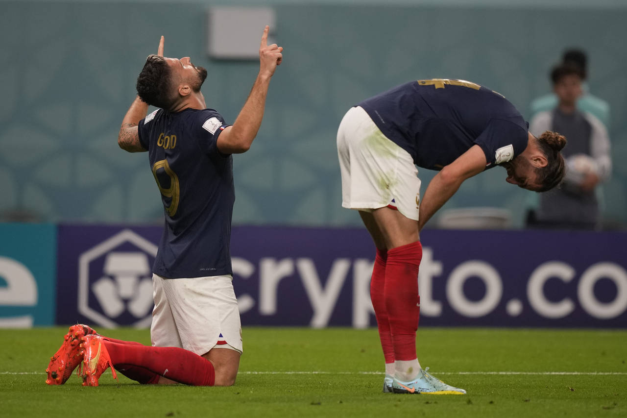 France's Olivier Giroud celebrate after he scored during the World Cup group D soccer match between...