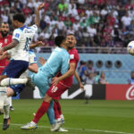 Iran goalkeeper clashes heads with teammate at World Cup