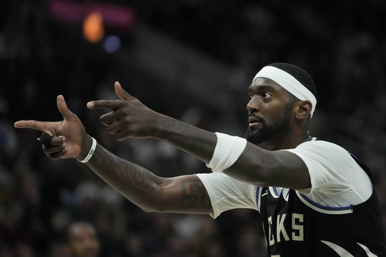 Milwaukee Bucks' Bobby Portis reacts to a call during the second half of an NBA basketball game aga...
