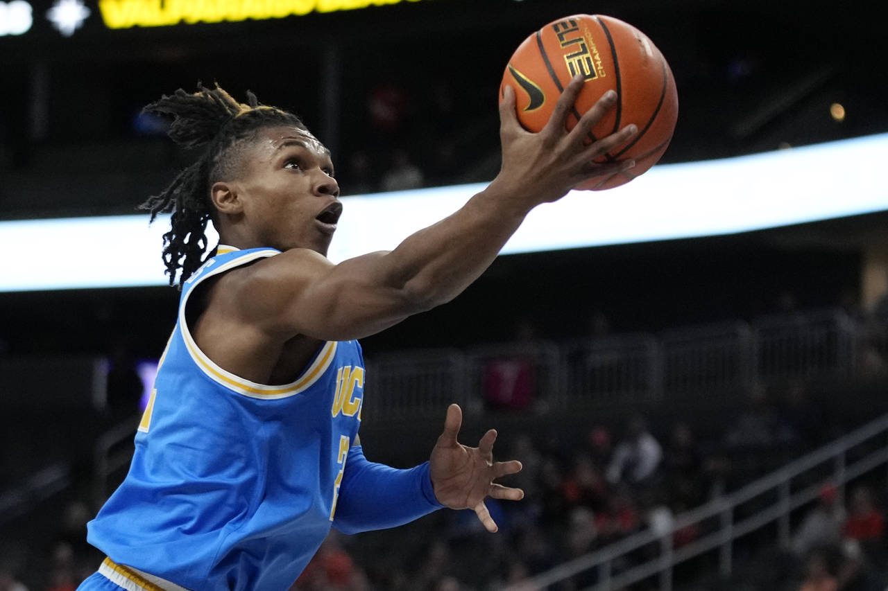 UCLA's Dylan Andrews (2) shoots against Baylor during the first half of an NCAA college basketball ...