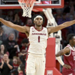 No. 11 Arkansas uses late run to beat Troy, 74-61
