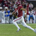 Young, No. 8 Alabama roll past Auburn 49-27 in Iron Bowl