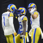Dalton thrives, Stafford leaves, as Saints top Rams 27-20