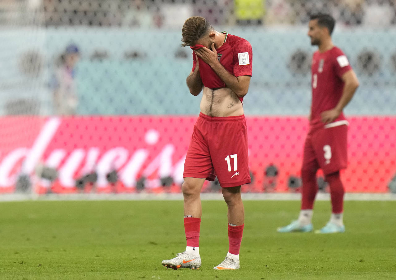 Iran's Ali Gholizadeh reacts during the World Cup group B soccer match between England and Iran at ...