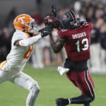 South Carolina runs over No. 5 Tennessee 63-38; Hooker hurt