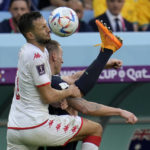 Australia beats Tunisia 1-0 to revive its World Cup campaign