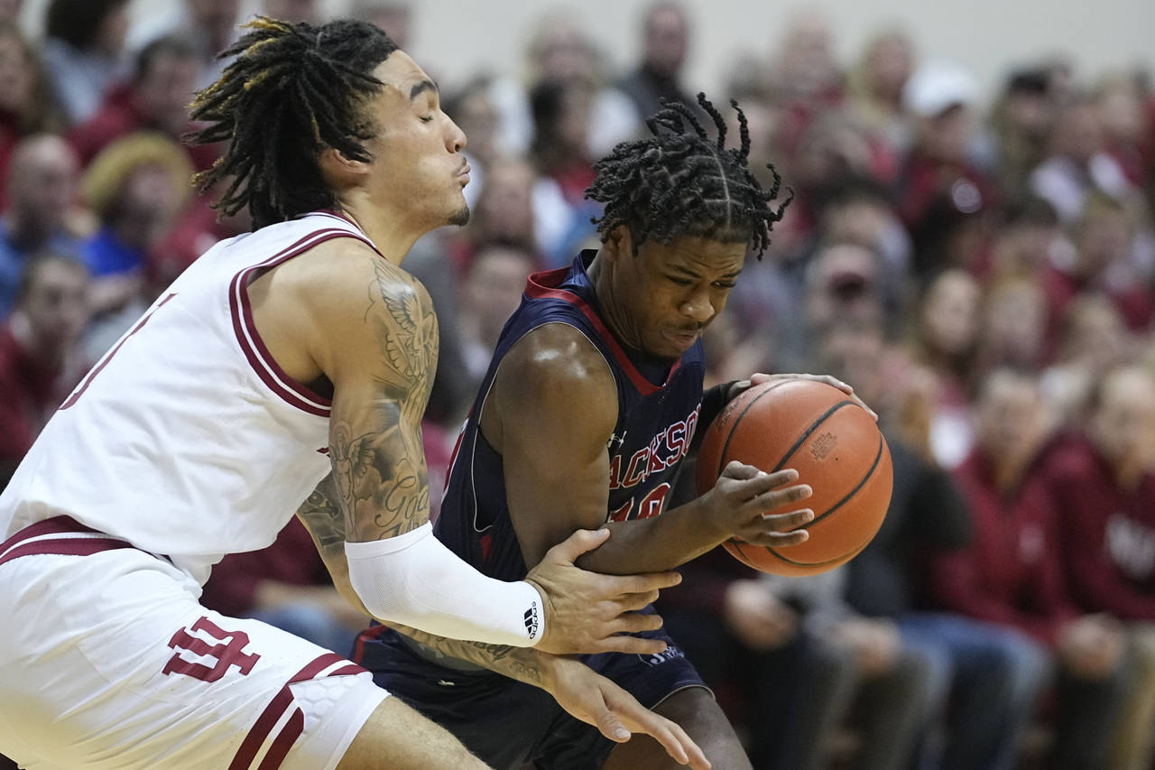 Jackson State guard Chase Adams (10) goes to the basket against Indiana guard Jalen Hood-Schifino (...
