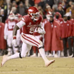 Arkansas rockets past No. 20 Ole Miss behind Sanders' 3 TDs