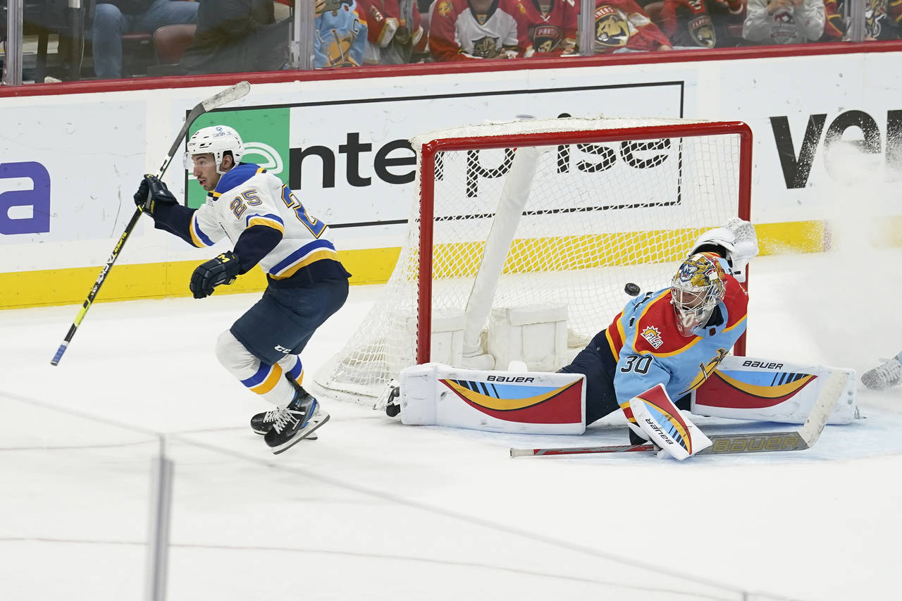 St. Louis Blues center Jordan Kyrou (25) scores the game winning goal against Florida Panthers goal...