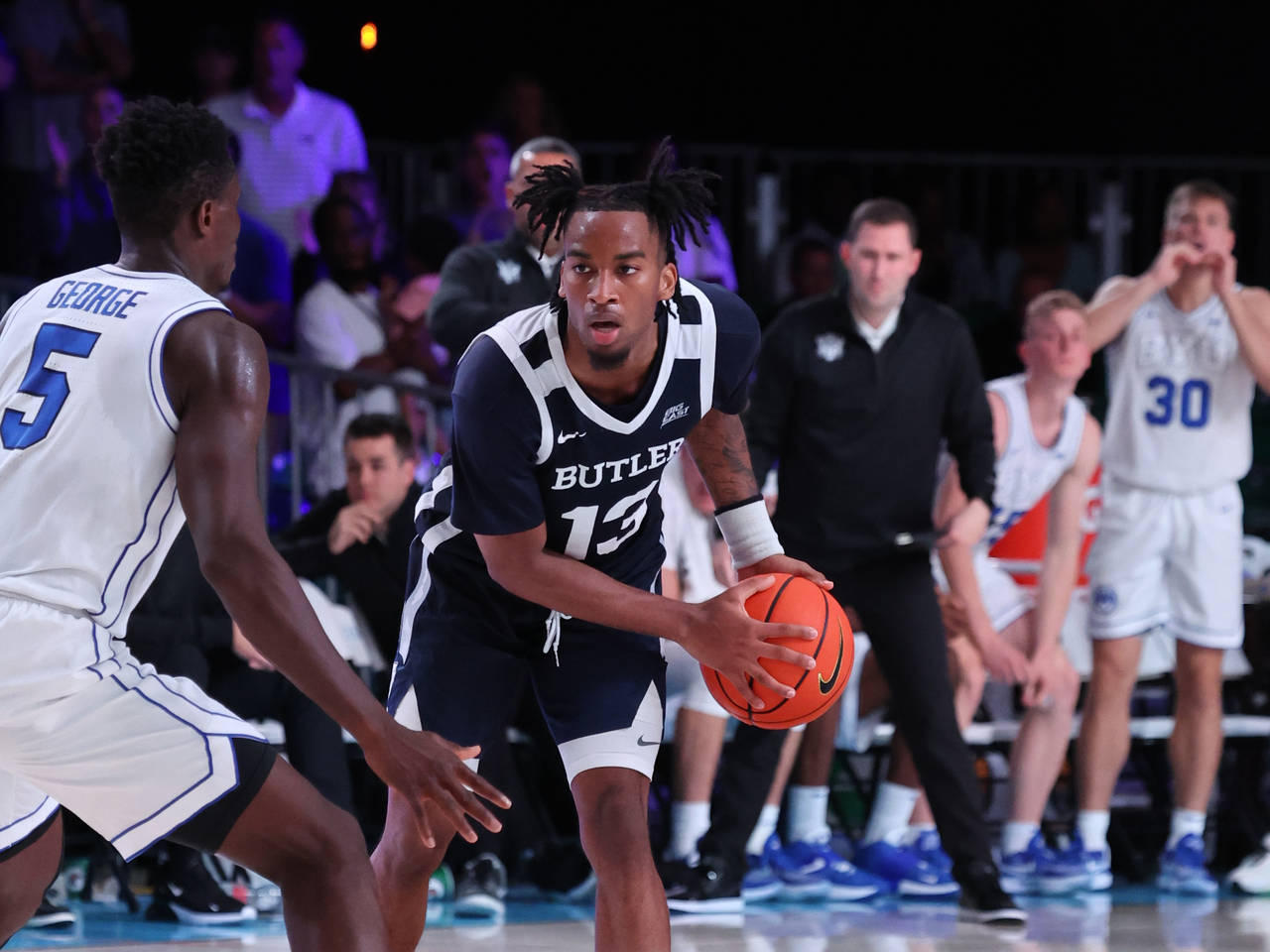 In a photo provided by Bahamas Visual Services, Butler's Jayden Taylor (13) is defended by BYU's Gi...