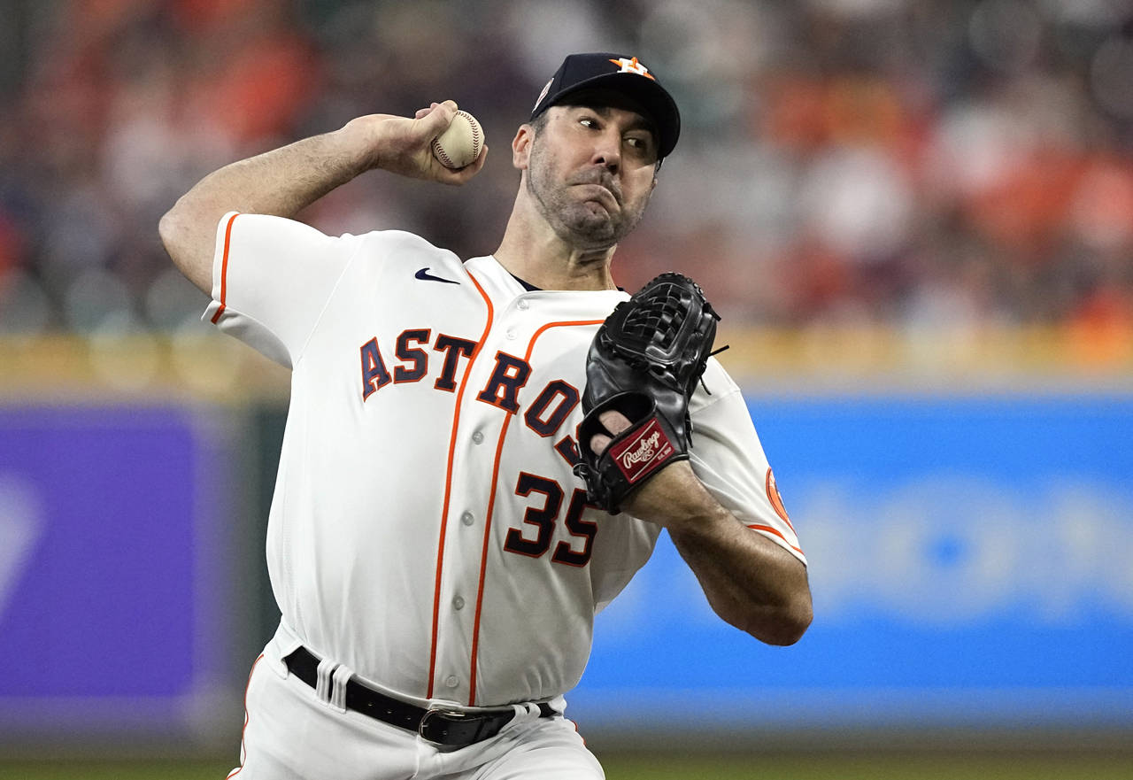 FILE - Houston Astros starting pitcher Justin Verlander throws to a Minnesota Twins batter during t...