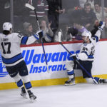 Morrissey's 2nd goal of game lifts Jets past Canes in OT