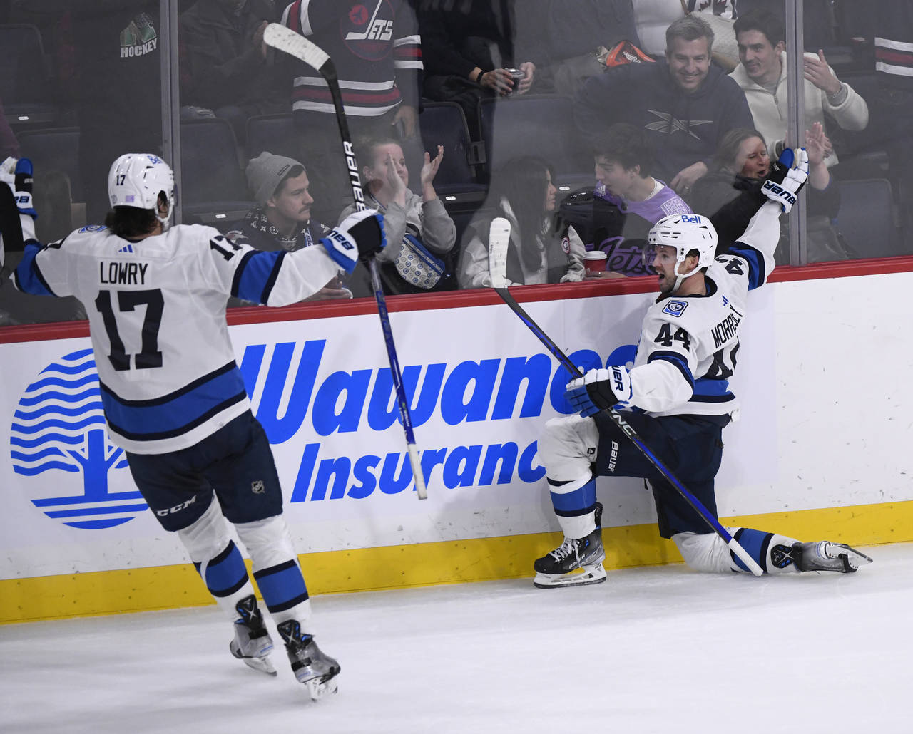 Winnipeg Jets' Josh Morrissey (44) celebrates after his winning goal against the Carolina Hurricane...