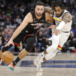 Towns scores 25, Wolves hold on against Heat for 105-101 win