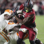 South Carolina runs over No. 5 Tennessee 63-38; Hooker hurt