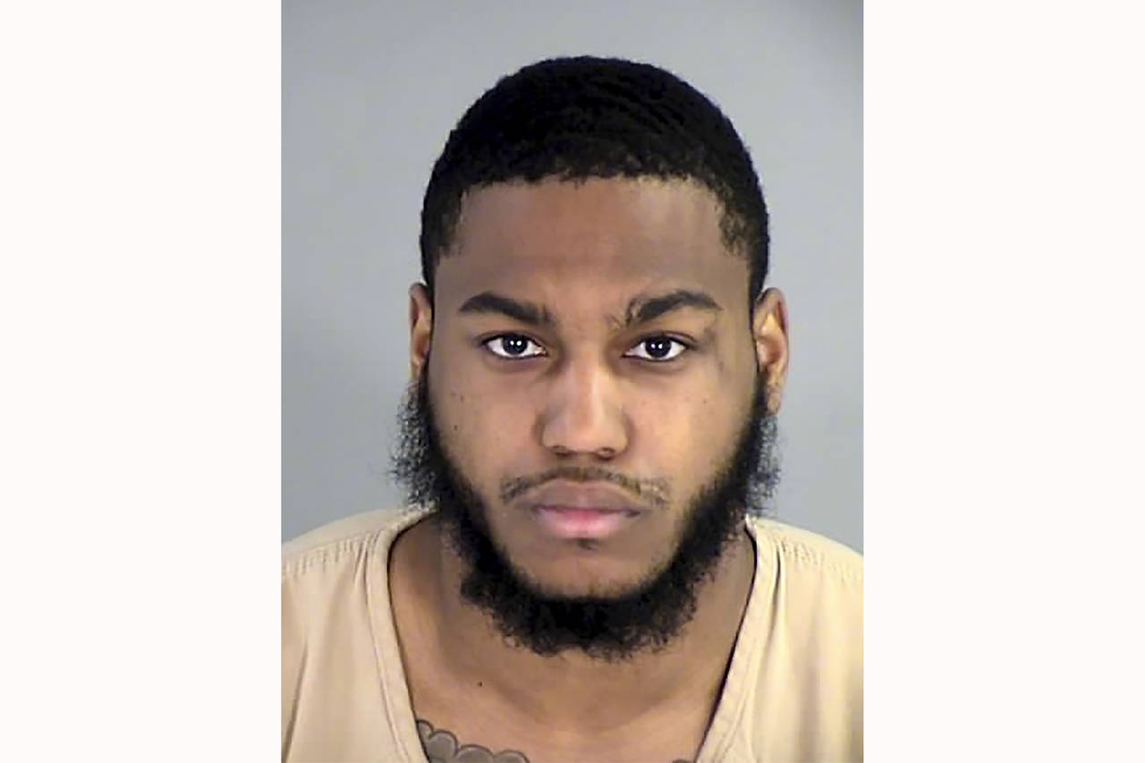 This booking photo released by the Henrico County Sheriff's Office shows Christopher Darnell Jones ...
