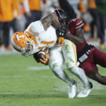 South Carolina runs over No. 5 Tennessee 63-38; Hooker hurt