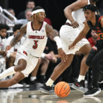 Scott scores 18, No. 22 Maryland blows out Louisville 79-54