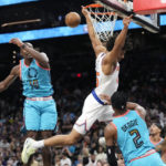 Payne, Booker lead Suns to 116-95 win over Knicks