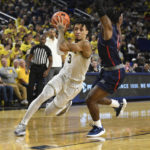 Howard scores 19, Michigan turns back Jackson State 78-68