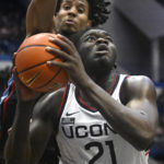 Sanogo leads unbeaten UConn past Delaware State 95-60