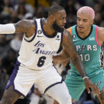 Lakers top Spurs in James' return for first road victory