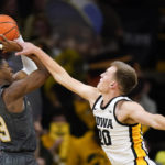 Murray has career night: 31 points, 20 rebounds in Iowa win
