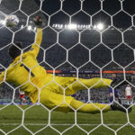 AP PHOTOS: World Cup highlights from Day 11