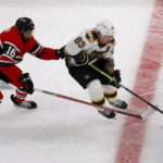 Bruins tie NHL mark for home start; beat Blackhawks, 6-1