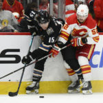 Ovechkin and Oshie power Capitals past Flames 3-0