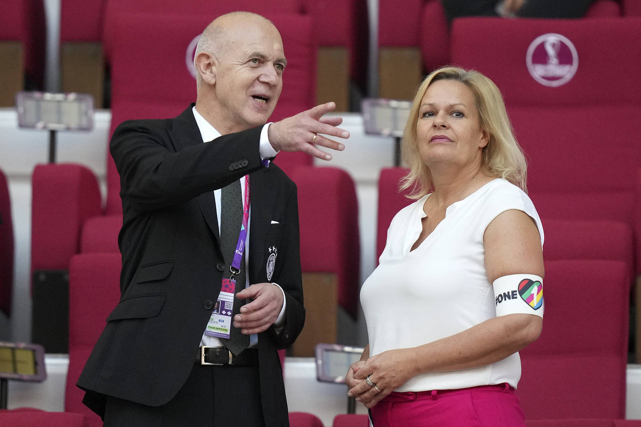 German Football Federation (DFB) President Bernd Neuendorf, left, talks to German Interior Minister...