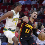 Green has 30 points, Rockets rally to beat Hawks 128-122