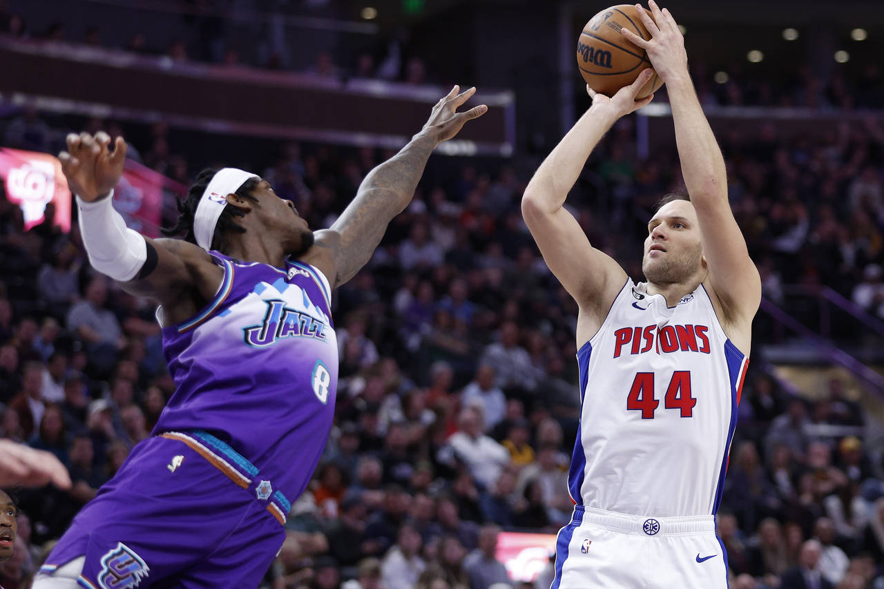 Detroit Pistons forward Bojan Bogdanovic (44) shoots against Utah Jazz forward Jarred Vanderbilt (8...