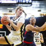 Clark scores 33 as No. 4 Iowa women defeat Belmont 73-62