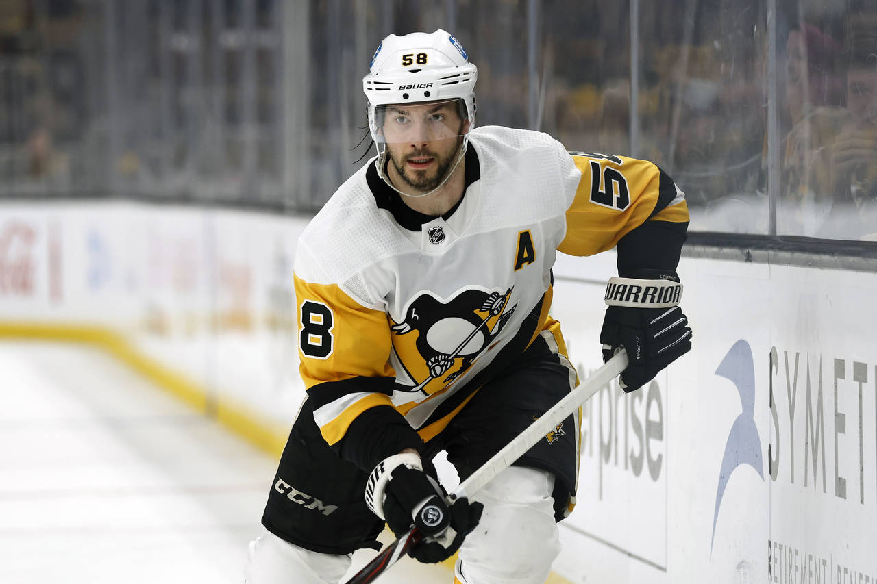 FILE - Pittsburgh Penguins' Kris Letang plays during the third period of an NHL hockey game against...