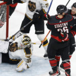 Bruins set NHL record: 12 straight home wins to start season