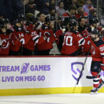 Devils top Oilers, tie franchise mark with 13th straight win
