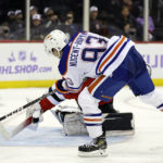Devils top Oilers, tie franchise mark with 13th straight win