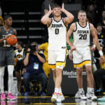 Murray has career night: 31 points, 20 rebounds in Iowa win
