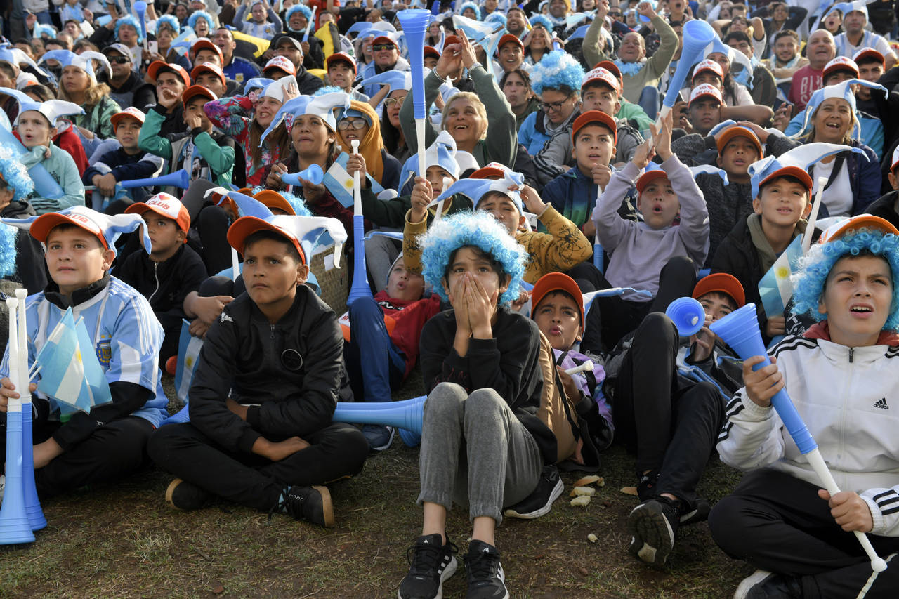 Argentina soccer fans watch the team lose to Saudi Arabia at a World Cup Group C soccer match playe...
